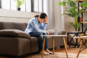 Woman with depression and relationship problems suffering from effects of toxic femininity